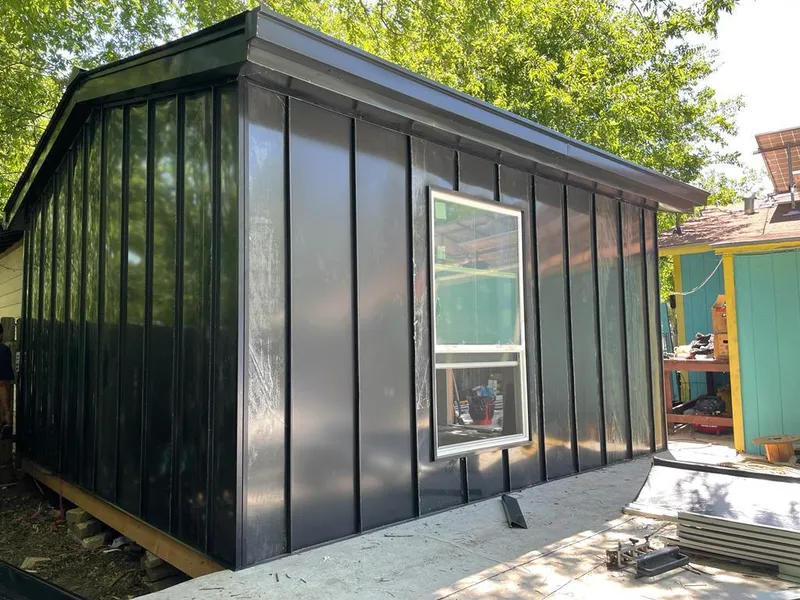 Black standing seam metal wall panels for Metal Roof Installation in Volney