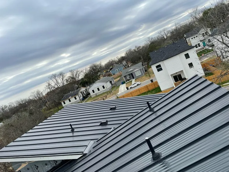 Standing seam metal roof panels with vents for Skylight Repair in Volney